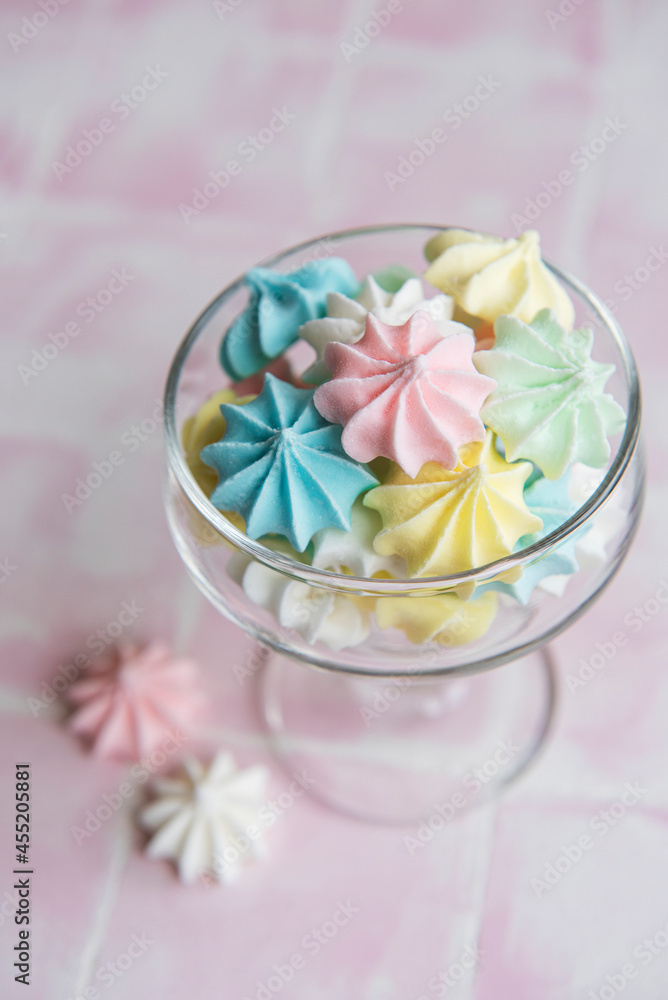 Small colorful meringues in the glass Small colorful meringues in the glass
