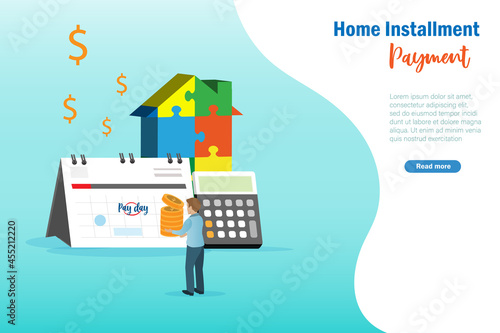 Home installment payment, home loans monthly payment concept. Man holding money pay for home loans within due date in calendar with jigsaw puzzle in house shape.