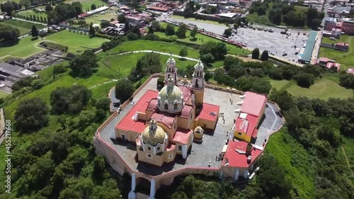 FLYING AROUND FAMOUS CHURCH IN CHOLULA, MEXICO - DRONE 4K photo