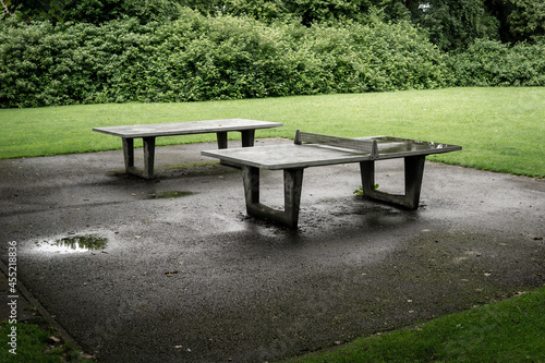 two table tennis table in the park