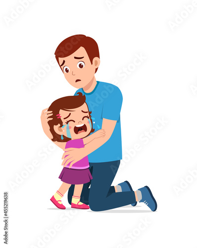 young father hug crying little girl and try to comfort