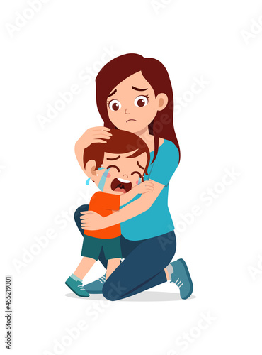 young mother hug crying little boy and try to comfort