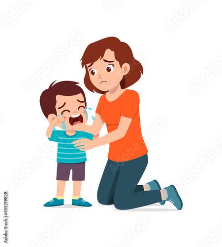 young mother hug crying little boy and try to comfort