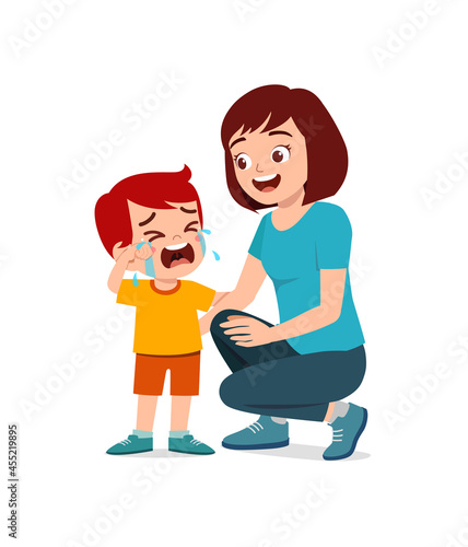 young mother hug crying little boy and try to comfort