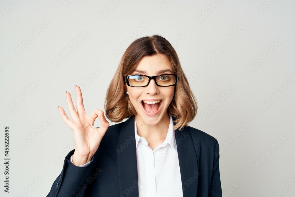 Business woman wearing short haired glasses emotions light background Business woman wearing short haired glasses emotions light background