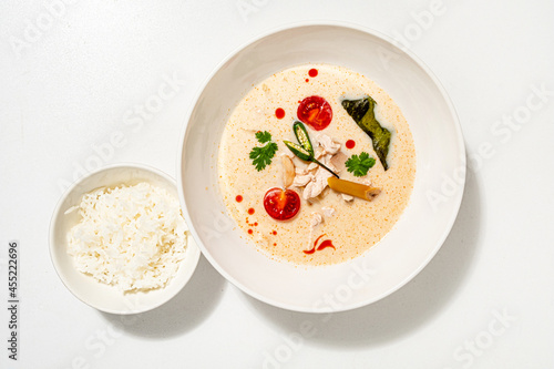 picy creamy coconut soup with chicken photo