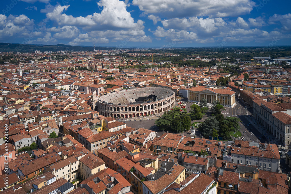 Fototapeta premium Verona, Italy aerial view of the historic city. Aerial panorama of Piazza Bra in Verona. Monument to Unesco Arena di Verona top view. Famous amphitheater in Italy aerial view.