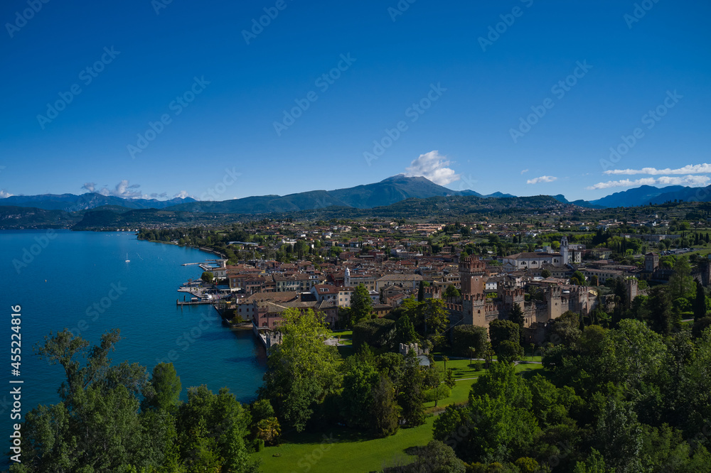 Lazise Lake Garda Italy. Panorama of the historic town of Lazise. Top view of the historic part of the city Lazise Castle on the coastline of Lake Garda. Aerial view of the Scaliger Castle of Lazise