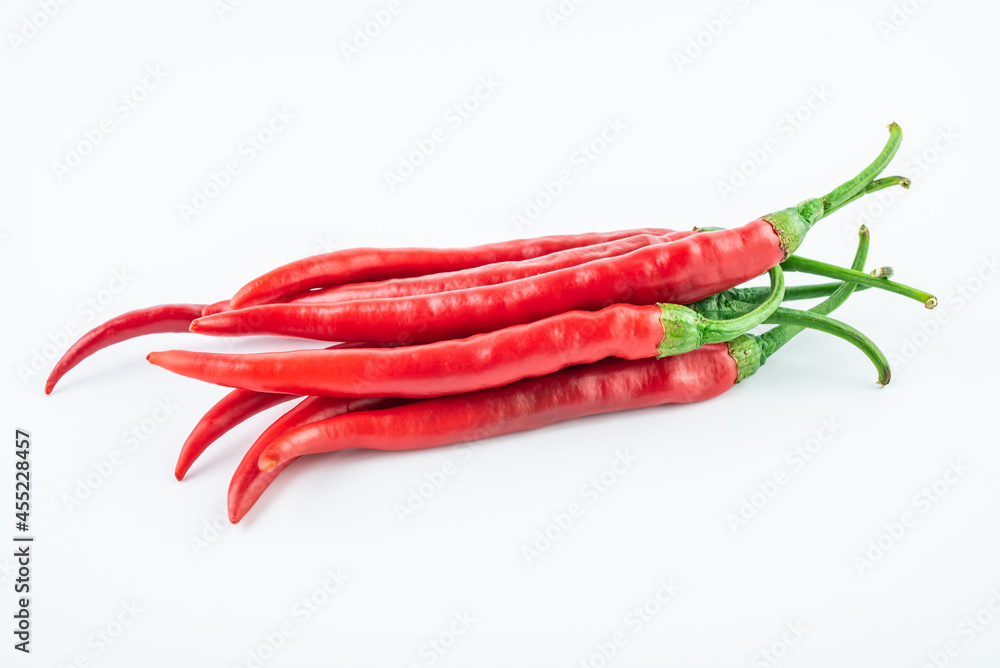 Fresh red peppers on white background Fresh red peppers on white background