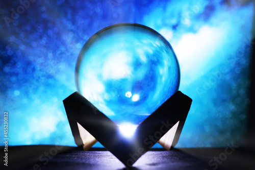 Fototapeta Naklejka Na Ścianę i Meble -  Magic ball predictions. mysterious composition. Fortune teller, mind power, prediction concept. Space inside.