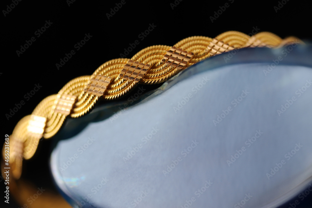Gold bracelet on blue agate stone Gold bracelet on blue agate stone