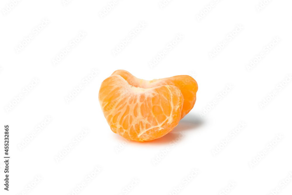 Mandarin pieces isolated on white background, close up
