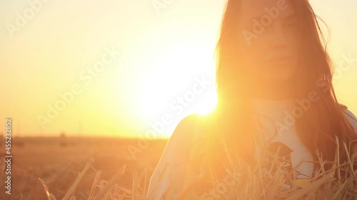 Beautiful woman in sunset