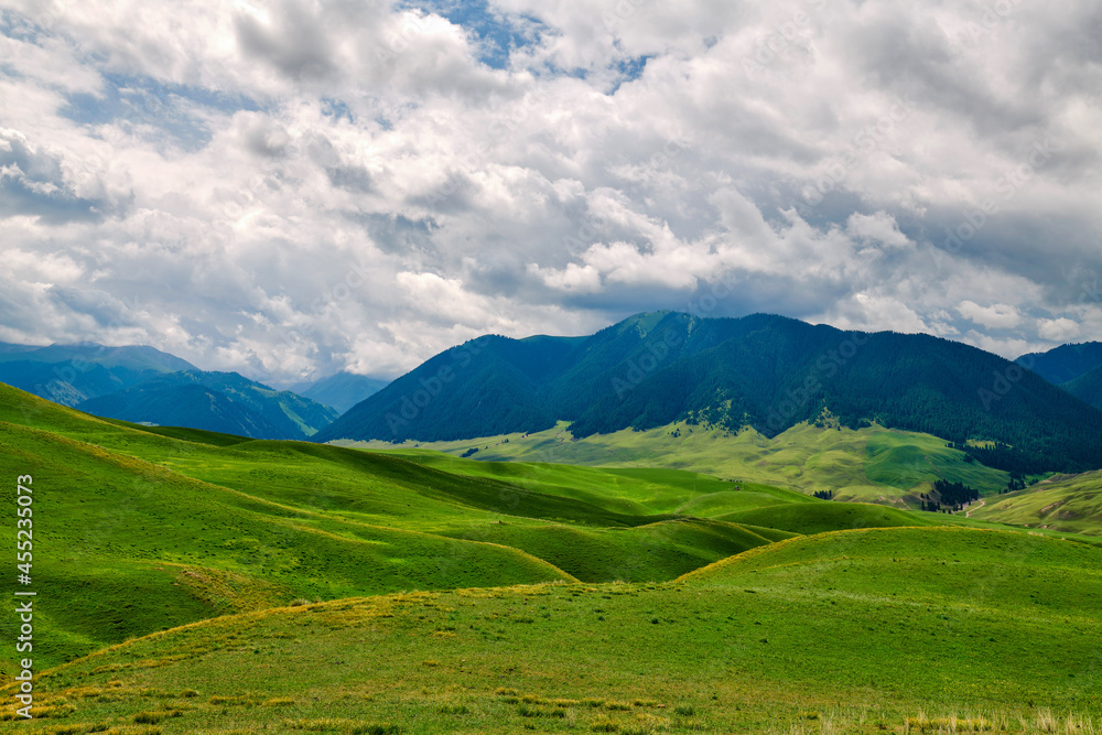Fototapeta premium Mountains and clouds landscape in summer