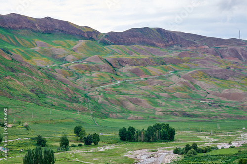 Colorful hillside of Tekesi county Yining city Xinjiang Uygur Autonomous Region, China. photo