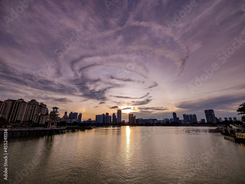 The mysterious yet dramatic cloud formation over the bay at the end of the Singapore Kallang River at dusk