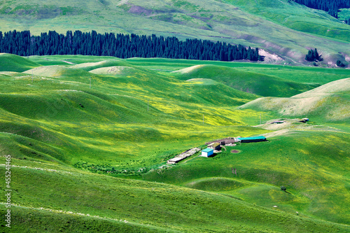 Village in canyon of Tekasi county Yining city Xinjiang Uygur Autonomous Region, China. photo