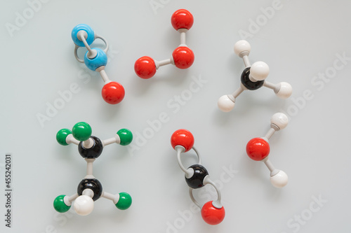 Obraz na plátně Picture of different greenhouse gases made by molecular model on white background
