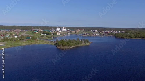 Solovki kremlin Russia aerial drone long approach, old russian tower on island 4K
