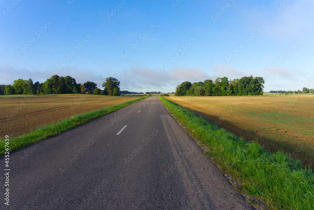 Low angle view of the empty rural asphalt road