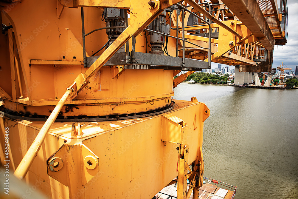 The back of a tower crane in Thailand taken on the side of the Chao Phaya River.