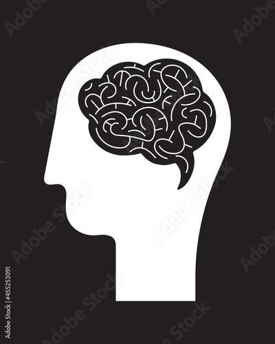 Abstract human head with brain icon. Vector illustration isolated on black background