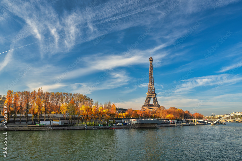 Fototapeta premium Paris France, city skyline at Eiffel Tower and Seine River Debilly Footbridge with autumn foliage season