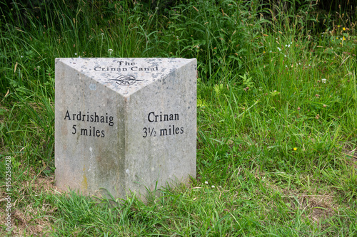 Crinan Canal mile marker in Argyll and Bute, Scotland photo