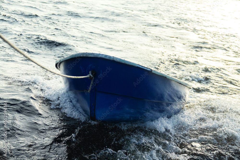 Poster boat is tethered behind fishing schooner, on trailers, under tow ...