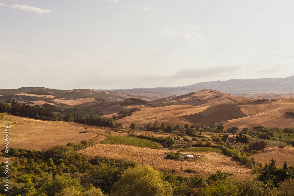 Panoramic view of the Tuscan countryside with the characteristic colors of its hills.