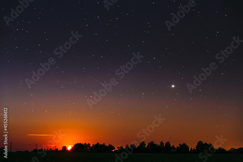 Moonrise Above Summer Forest park. Night Countryside Summer Starry Night Sky landscape