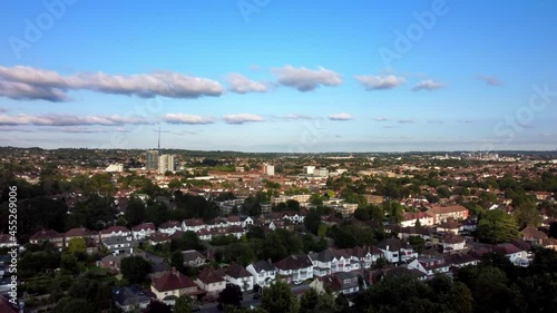 Cinematic aerial shot of an English town in North London on a summer day photo