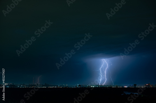 Lightning strike over night city