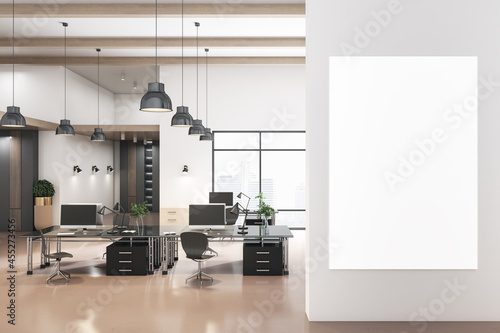 Modern coworking concrete office interior with city view, empty white poster and daylight. Mock up, 3D Rendering. photo