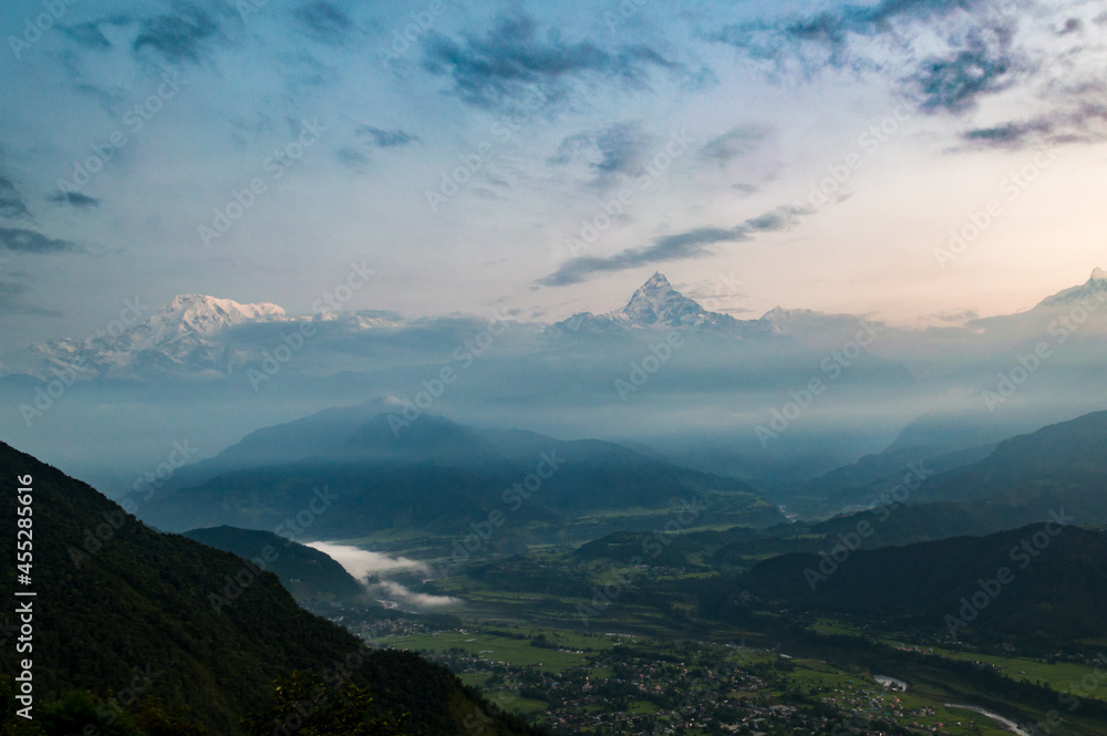 Looking across the Pokhara Valley to the Himalayas and Fish Tail Mountain from Sarangkot at sunrise