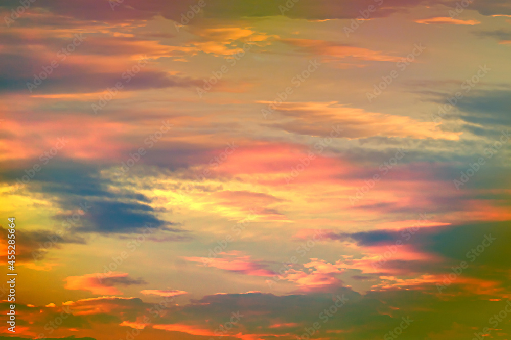 Dramatic sunset sky soft cloudy is gradient pastel, Abstract sky background . Image contain certain grain or noise and soft focus.