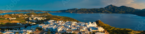 View of Plaka village on Milos island on sunset in Greece © Dmitry Rukhlenko