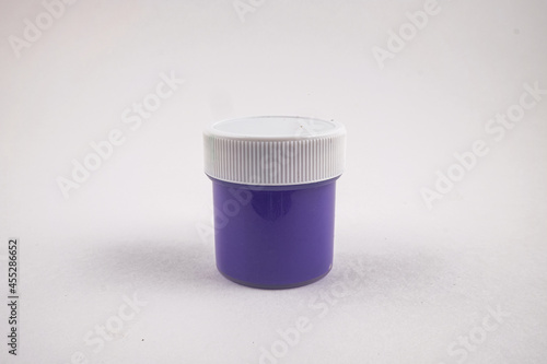 Jars of paint on a white background