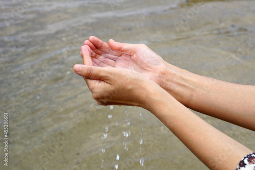 A person take water with hand