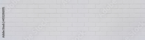 Weiß gestrichene Backsteinwand in Panorama Nahaufnahme