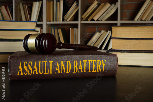 Law about assault and battery and gavel. photo