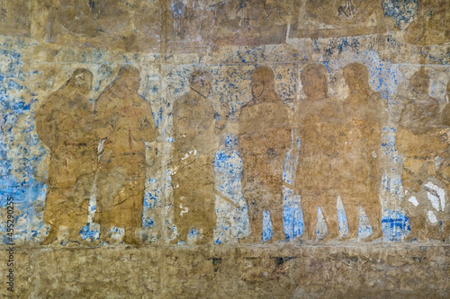 Central Asian fresco of the 7th-8th centuries from the Ishhid palace. Depicted are court warriors or nobles with swords. Afrasiab Museum, Samarkand, Uzbekistan photo