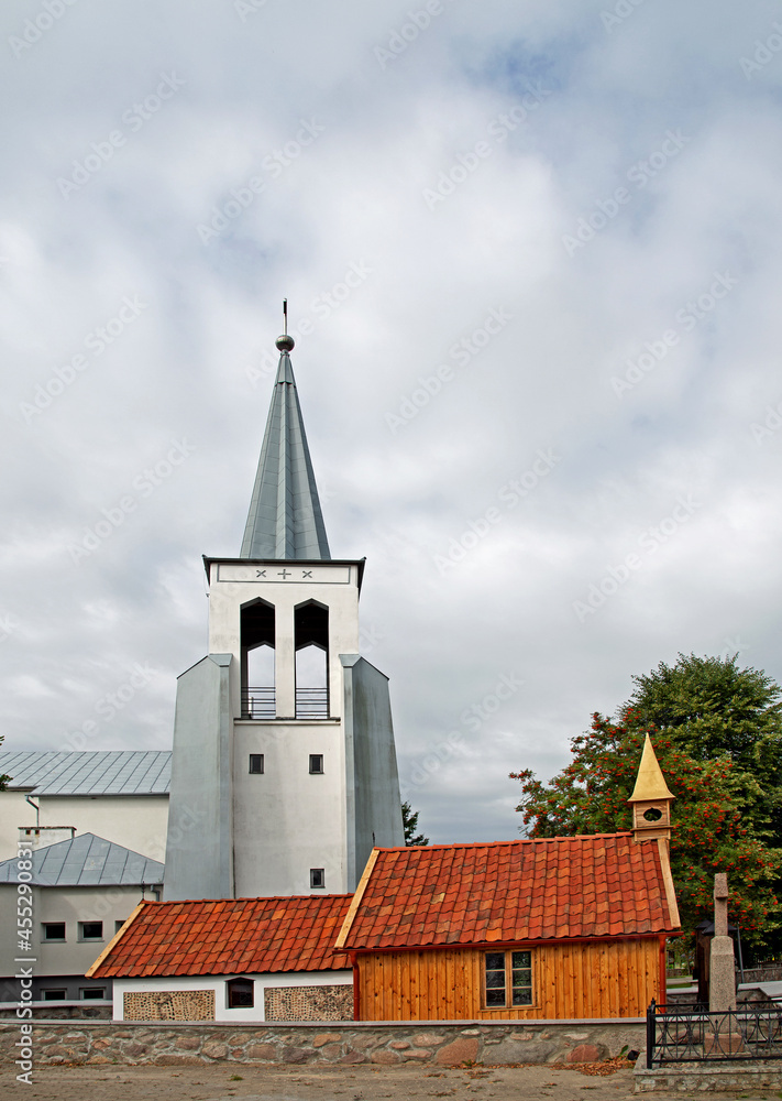 General view and architectural details of a brick Catholic chapel from 1863 and a wooden part added to it in 1905 in Pogorzalki in Podlasie, Poland. General view and architectural details of a brick Catholic chapel from 1863 and a wooden part added to it in 1905 in Pogorzalki in Podlasie, Poland.