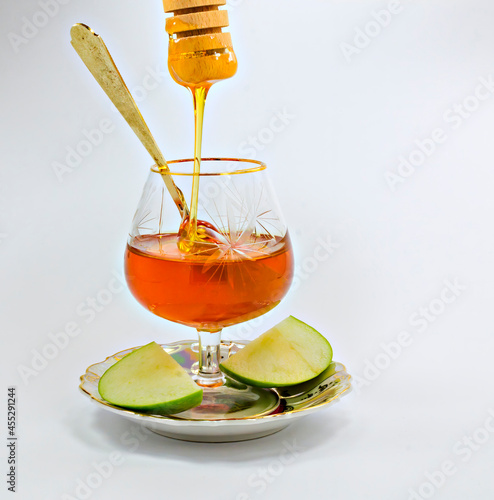 Honey and apple are sweet symbols of Jewish New Year - Rosh Hashanah