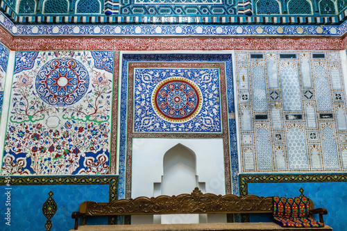 Details of wall with Eastern ornaments. Mausoleum of Qutham ibn Abbas of XIV century. Historical complex Shah-i Zinda, Samarkand, Uzbekistan