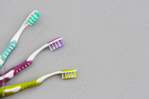 multi-colored toothbrushes for brushing teeth