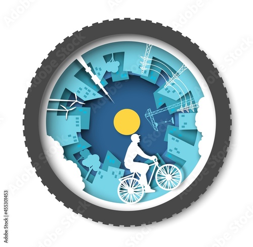 Eco friendly city with buildings, windmills and young man riding bicycle, vector paper cut illustration. City transport.