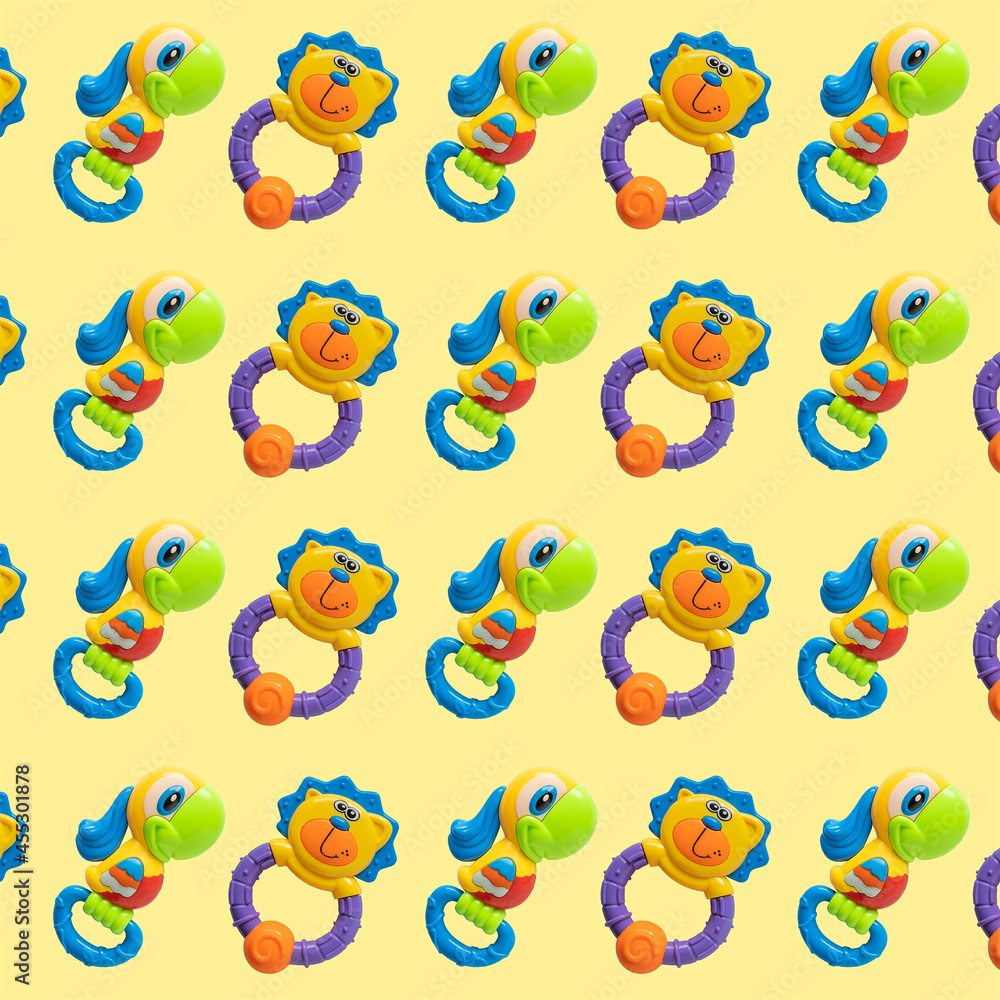 Obraz premium Rattle toys pattern on color background.