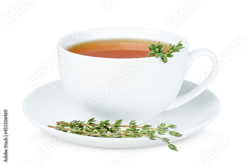one white cup of tea with fresh thyme sprigs on isolated white background