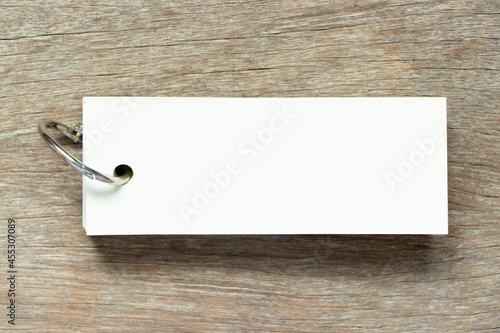 Blank white color fash card on wood background